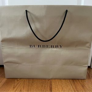 Burberry large shopping bag with plaid interior.
